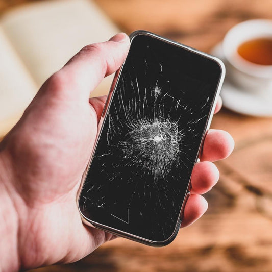 Cracked phone screen, broken glass